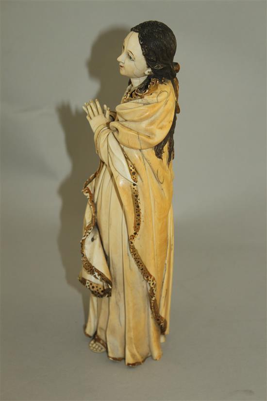 An 18th century Indo-Portuguese carved ivory figure of the Virgin Mary, probably Goa, c.1740-50, 11.5in.